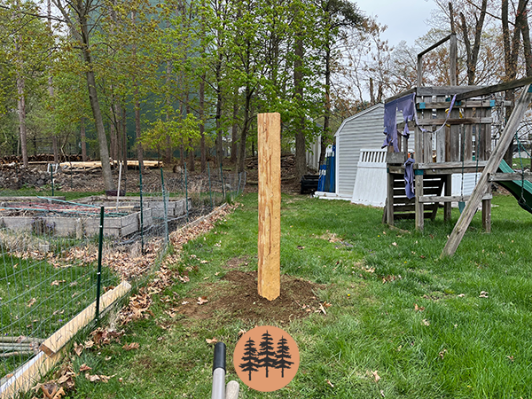 split-rail-fence-construction-first-post-set-in-the-ground